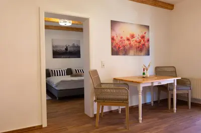 Ein Bett oder Betten in einem Zimmer der Unterkunft Lärchenhof Harz