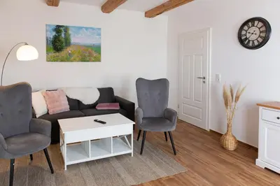 Ein Sitzbereich in der Unterkunft Lärchenhof Harz