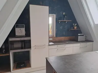 Küche/Küchenzeile in der Unterkunft DESIGN-LOFT Brockenblick -Netflix-Smart TV-WLAN-Wallbox-Kaffeevollautomat-Balkon- Panoramaaussicht-Getränke-Pizza-Snacks