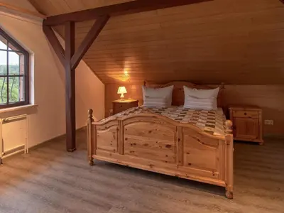 Ein Bett oder Betten in einem Zimmer der Unterkunft Haus Freigeist - zum Ortsblick
