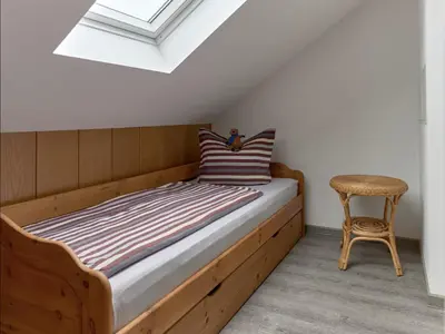 Ein Bett oder Betten in einem Zimmer der Unterkunft Haus Freigeist - zum Ortsblick