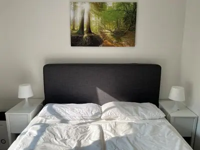 Ein Bett oder Betten in einem Zimmer der Unterkunft Ferienwohnung Panoramablick 33