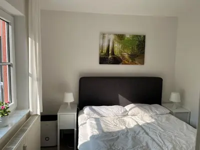 Ein Bett oder Betten in einem Zimmer der Unterkunft Ferienwohnung Panoramablick 33