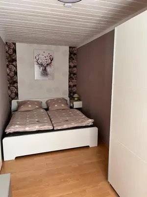 Ein Bett oder Betten in einem Zimmer der Unterkunft Ferienwohnung auf dem Löperhof in der Altstadt