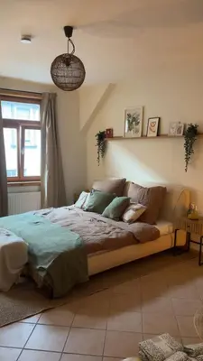 Ein Bett oder Betten in einem Zimmer der Unterkunft Wohlfühloase in der Altstadt 200m vom Marktplatz entfernt
