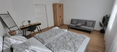 Ein Bett oder Betten in einem Zimmer der Unterkunft Ferienwohnung Kaiserblick