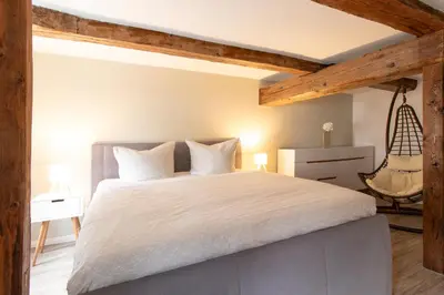 Ein Bett oder Betten in einem Zimmer der Unterkunft Ferienwohnung am Stadtschloss