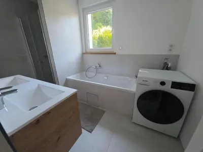 Ein Badezimmer in der Unterkunft Ferienbungalow mit 2 Schlafzimmern, Sauna & Whirlpool