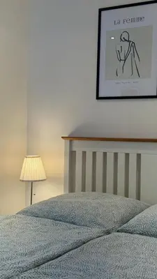 Ein Bett oder Betten in einem Zimmer der Unterkunft Goslar FeWo Kultur & Naturgenuss