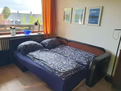 Ein Bett oder Betten in einem Zimmer der Unterkunft Fewo Falkennest