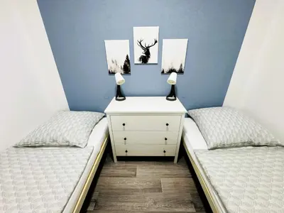 Ein Bett oder Betten in einem Zimmer der Unterkunft FeWo Hochwald Hahnenklee