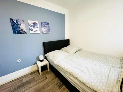 Ein Bett oder Betten in einem Zimmer der Unterkunft FeWo Hochwald Hahnenklee