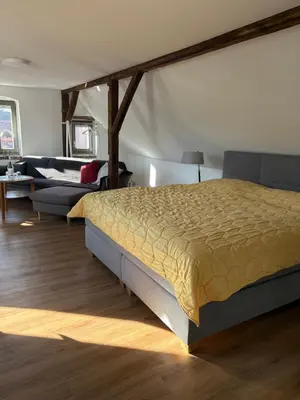 Ein Bett oder Betten in einem Zimmer der Unterkunft Quartier Alte Werkstatt