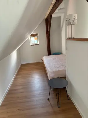 Ein Bett oder Betten in einem Zimmer der Unterkunft Quartier Alte Werkstatt