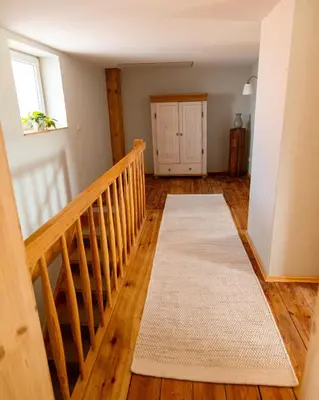 Ein Bett oder Betten in einem Zimmer der Unterkunft An der Linde