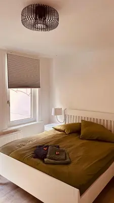 Ein Bett oder Betten in einem Zimmer der Unterkunft Kirchblickapartment Zorge