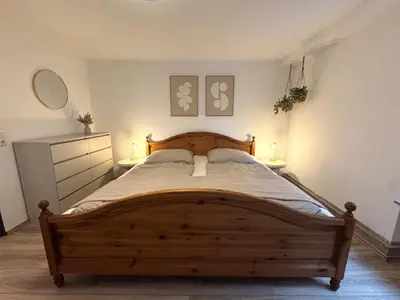 Ein Bett oder Betten in einem Zimmer der Unterkunft Ferienwohnung Leni