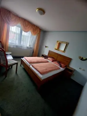 Ein Bett oder Betten in einem Zimmer der Unterkunft CS HARZgeflüster-Das Familienhotel