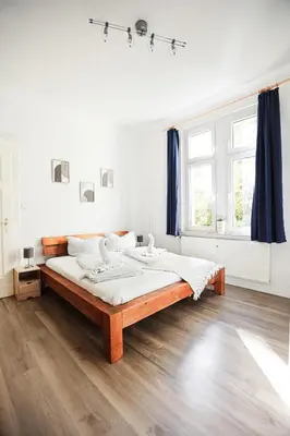 Ein Bett oder Betten in einem Zimmer der Unterkunft Ferienapartments in Schierke am Brocken direkte Wanderweglage