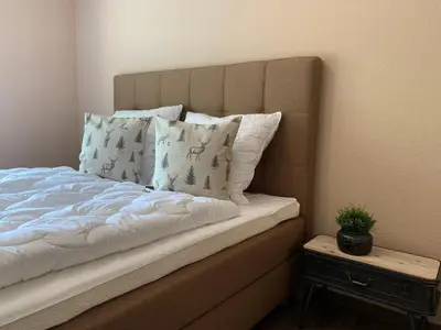 Ein Bett oder Betten in einem Zimmer der Unterkunft Bocksberg-Baude