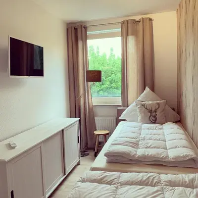 Ein Bett oder Betten in einem Zimmer der Unterkunft Berg-Quartier