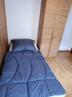 Ein Bett oder Betten in einem Zimmer der Unterkunft Altes Haus, Untere Etage