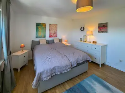 Ein Bett oder Betten in einem Zimmer der Unterkunft Ferienwohnung Feline
