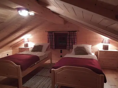 Ein Bett oder Betten in einem Zimmer der Unterkunft Blockhaus Bodefall