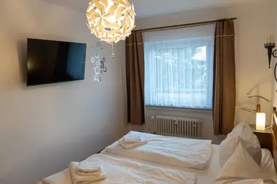 Ein Bett oder Betten in einem Zimmer der Unterkunft FeWo Harzer Wiesenberg, bis zu 2 Hunde willkommen!