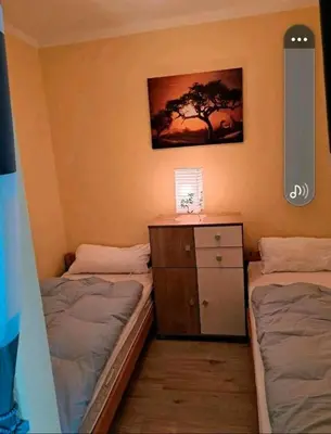 Ein Bett oder Betten in einem Zimmer der Unterkunft Ferienwohnung Relax 5