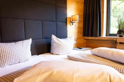 Ein Bett oder Betten in einem Zimmer der Unterkunft StrandBerg's Harzchalet