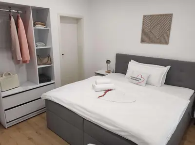 Ein Bett oder Betten in einem Zimmer der Unterkunft Ferienwohnung Altstadtherz