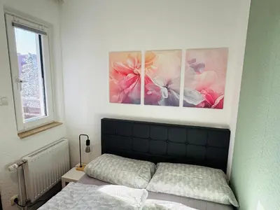 Ein Bett oder Betten in einem Zimmer der Unterkunft FeWo Auszeit im Ferienpark Altenau