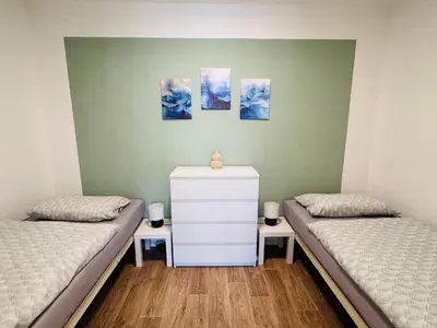 Ein Bett oder Betten in einem Zimmer der Unterkunft FeWo Auszeit im Ferienpark Altenau