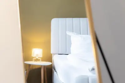 Ein Bett oder Betten in einem Zimmer der Unterkunft Harter Brocken Tatort Apartment 2 Einheiten