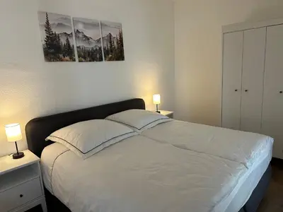 Ein Bett oder Betten in einem Zimmer der Unterkunft Ferienwohnung Mauerperle