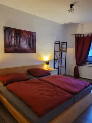 Ein Bett oder Betten in einem Zimmer der Unterkunft Fewo Langenstein