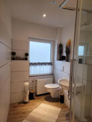 Ein Badezimmer in der Unterkunft Fewo Langenstein