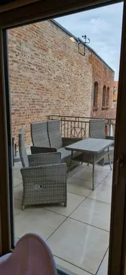 Ein Sitzbereich in der Unterkunft Apartments in der Barockscheune