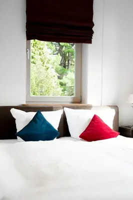 Ein Bett oder Betten in einem Zimmer der Unterkunft Holiday Home Villa Waldidyll by Interhome
