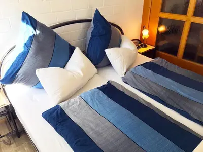 Ein Bett oder Betten in einem Zimmer der Unterkunft Apartment Fewo für 2 Personen mit Wintergarten by Interhome