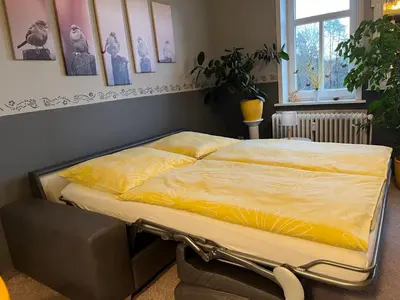 Ein Bett oder Betten in einem Zimmer der Unterkunft Apartment Das Spatzennest by Interhome