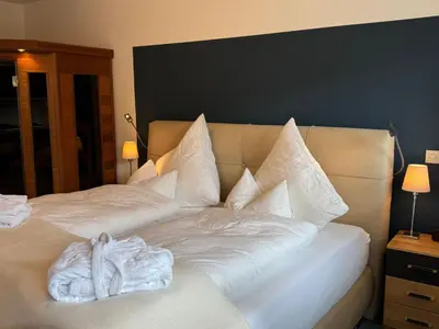 Ein Bett oder Betten in einem Zimmer der Unterkunft Apartment Ferienwohnung mit Infrarotwärmekabine by Interhome