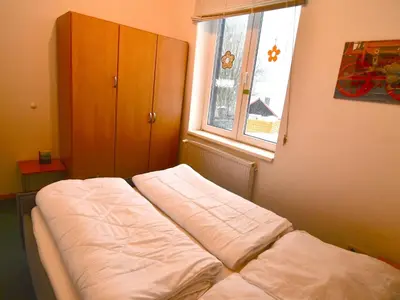 Ein Bett oder Betten in einem Zimmer der Unterkunft Apartment Große und moderne Ferienwohnung im Erdgeschoss by Interhome