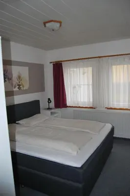 Ein Bett oder Betten in einem Zimmer der Unterkunft Apartment Fewo Stricker 11- by Interhome