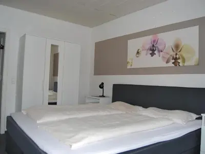 Ein Bett oder Betten in einem Zimmer der Unterkunft Apartment Fewo Stricker 21 by Interhome