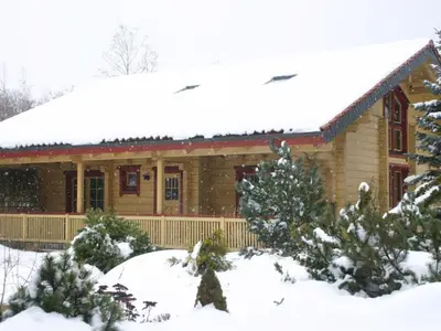 Apartment Gemütliches Blockhaus in Waldrandlage mit Sauna by Interhome im Winter