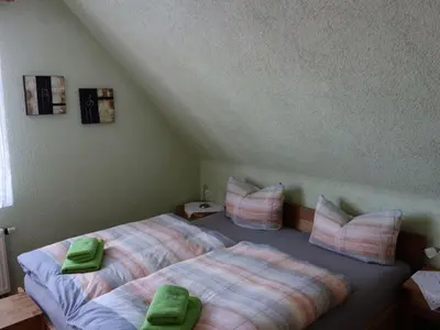 Ein Bett oder Betten in einem Zimmer der Unterkunft Apartment Dorle by Interhome