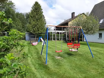 Ein Kinderspielbereich in der Unterkunft Ferienwohnungen Stricker Harz
