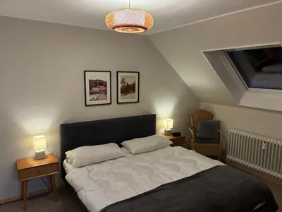 Ein Bett oder Betten in einem Zimmer der Unterkunft Harz-Urlaub-Altenau - Hunde willkommen